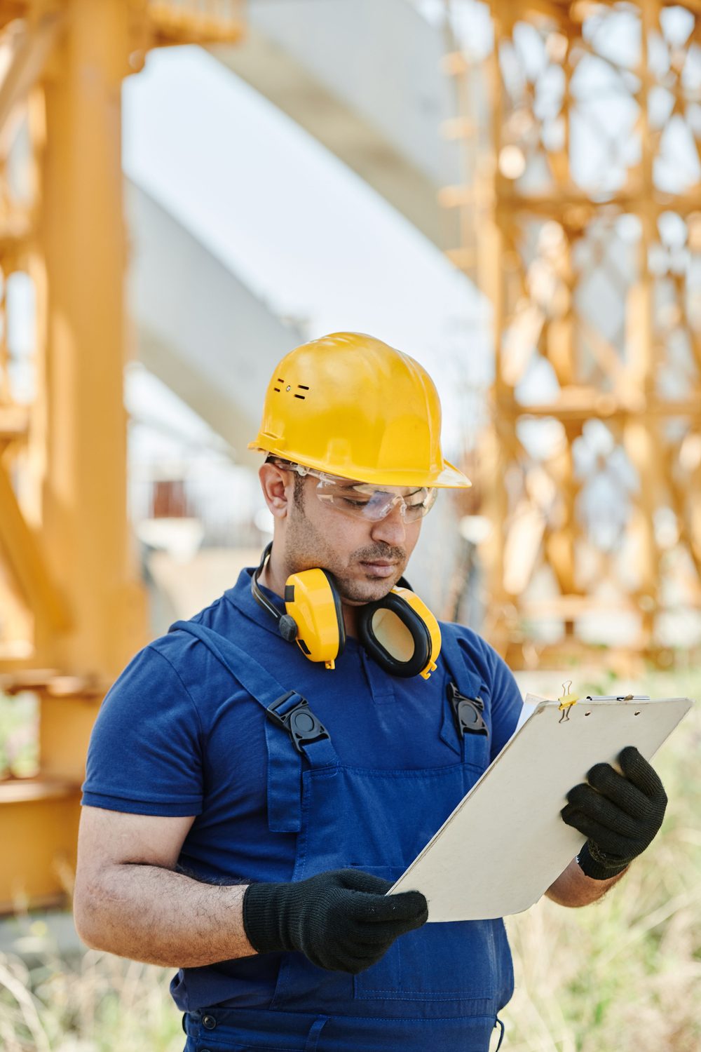 Safety consultant reviewing a job site inspection checklist.